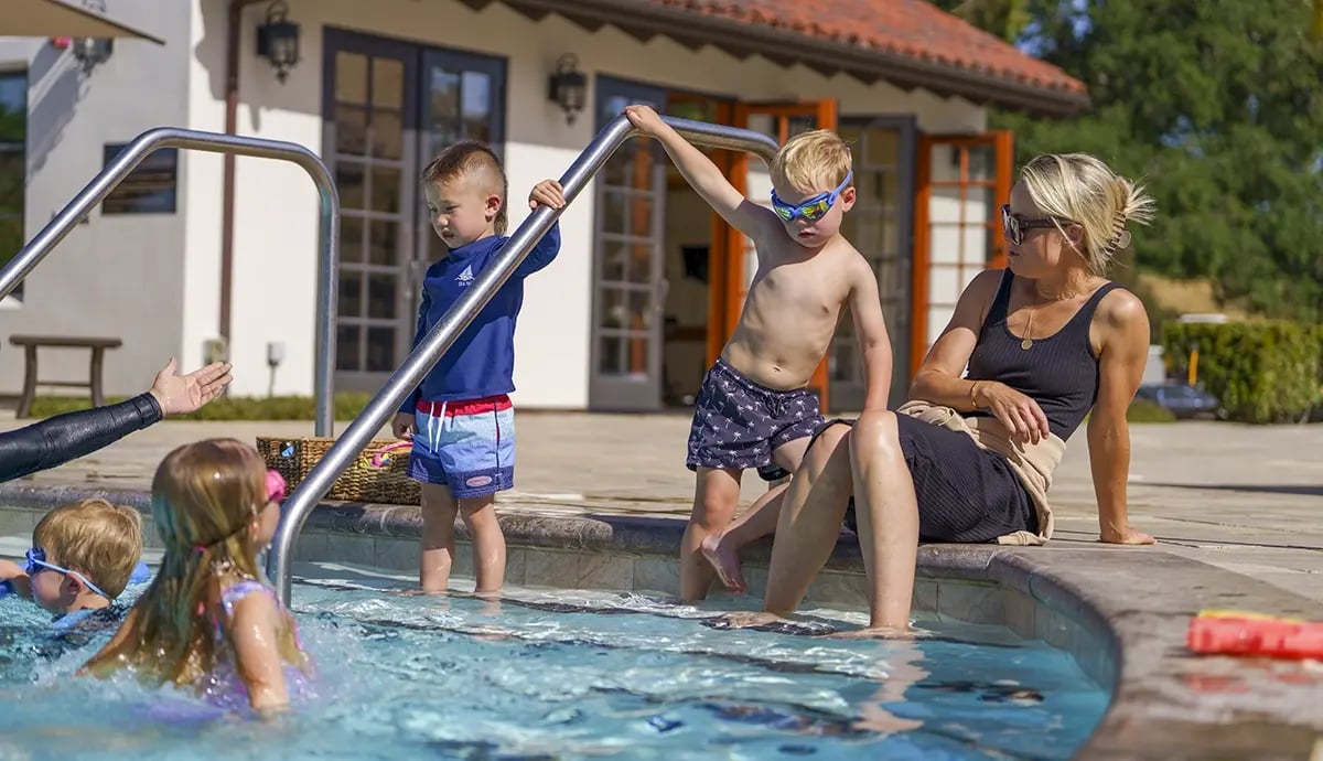 mom with kids pool